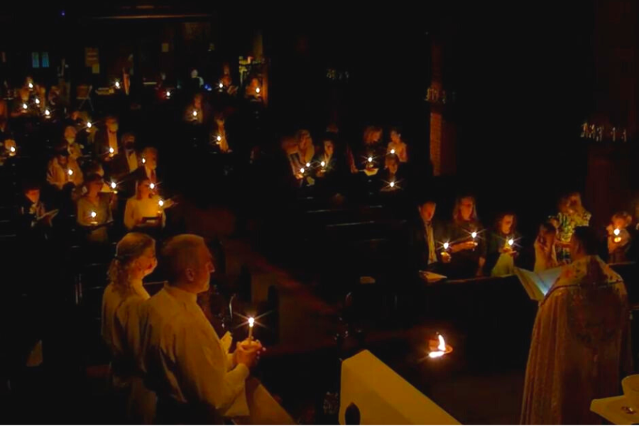 Parishioners holding candles during Parish of the Epiphany's 2023 Great Viigil of Easter
